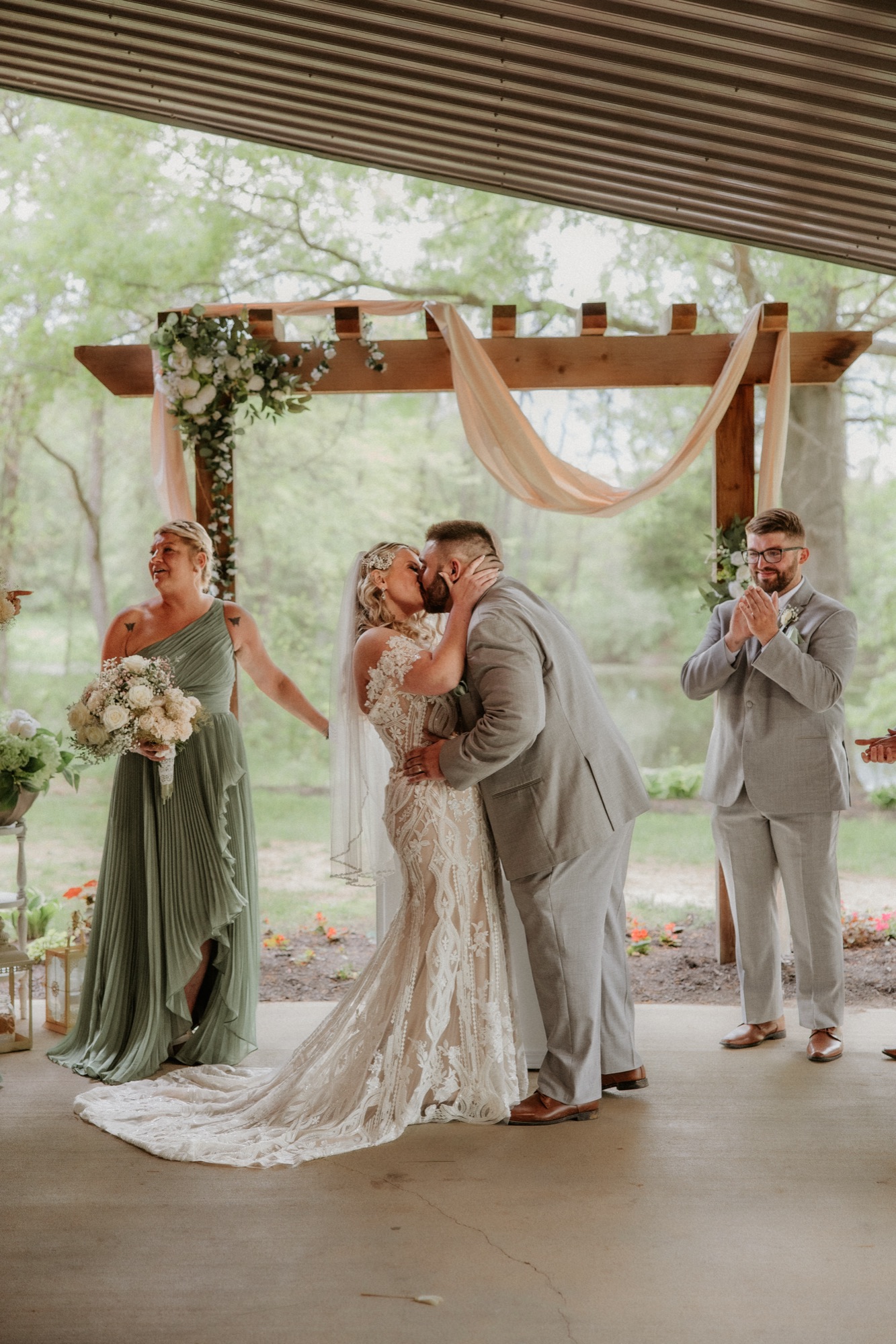 Wedding ceremony under the covered space at Abram Farms