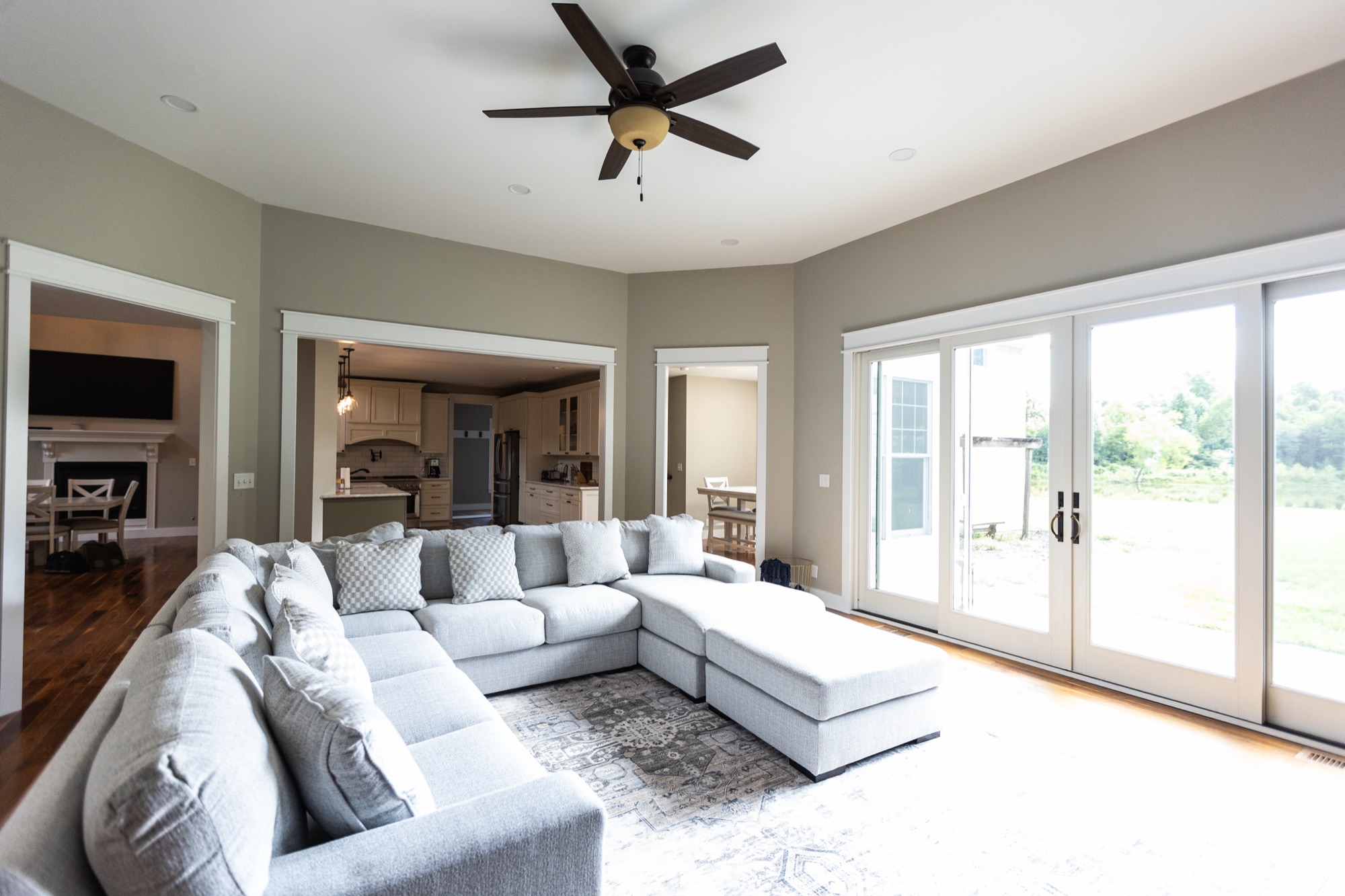 Living room at Lakeside Manor with sliding doors to the patio