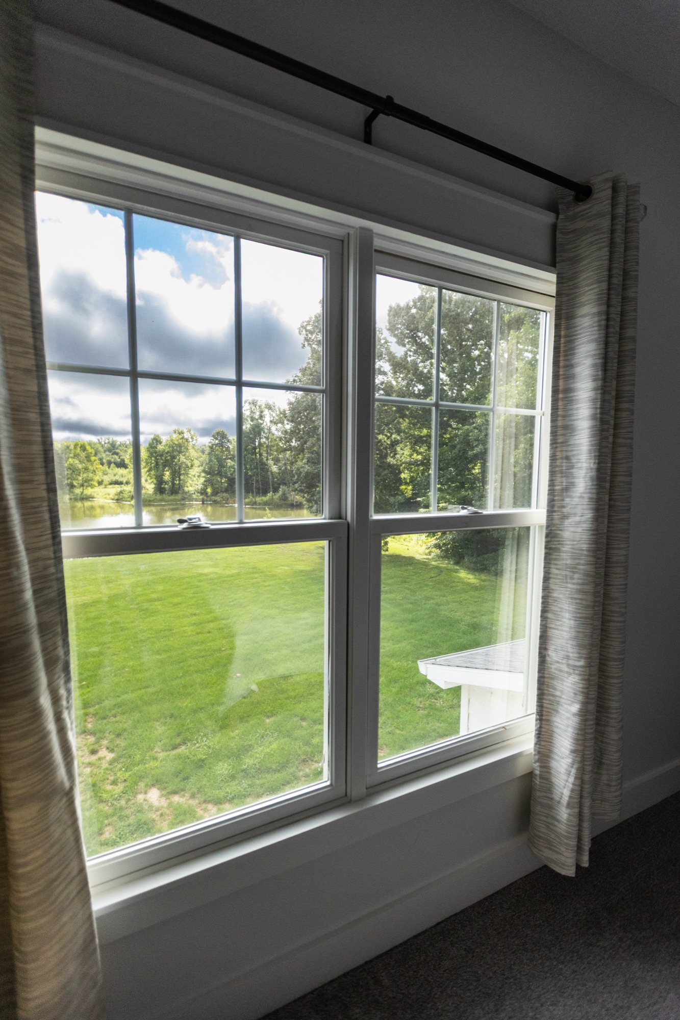Bedroom window view of the pond at Lakeside Manor