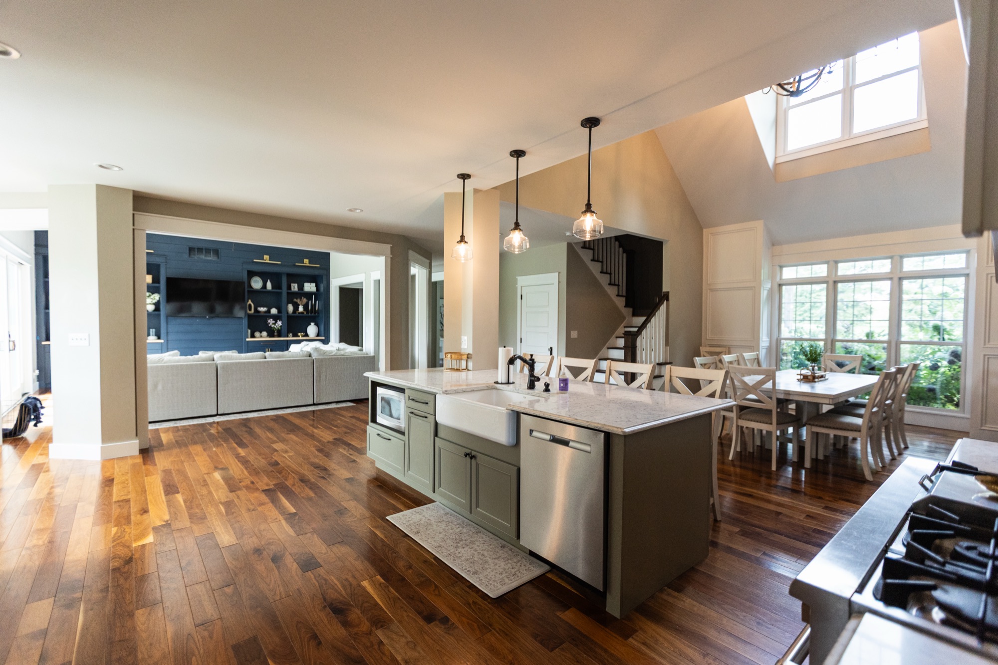 Open-concept living, dining, and kitchen area at Lakeside Manor